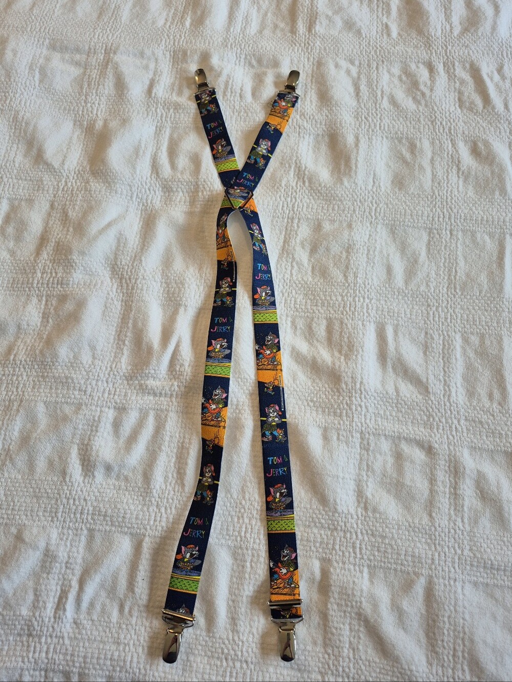 Vintage children's suspenders featuring a Tom and Jerry cartoon print EUC